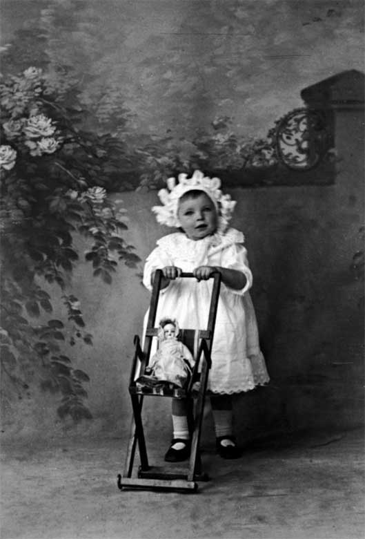 Mum, with toy on chair.